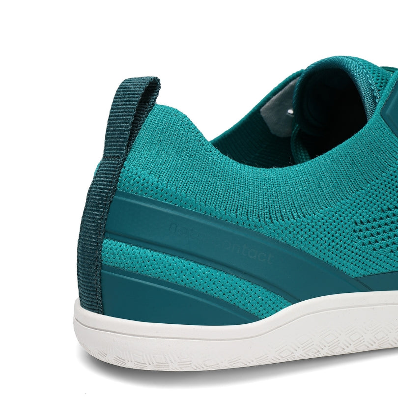 Teal barefoot sneaker with white sole on a white background back detail