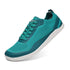 Teal barefoot sneaker with white sole on a white background