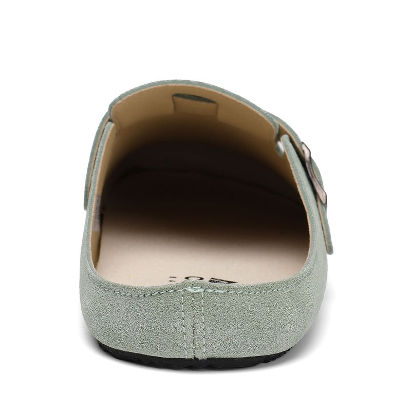 green barefoot suede clog with a strap on a white background rear view