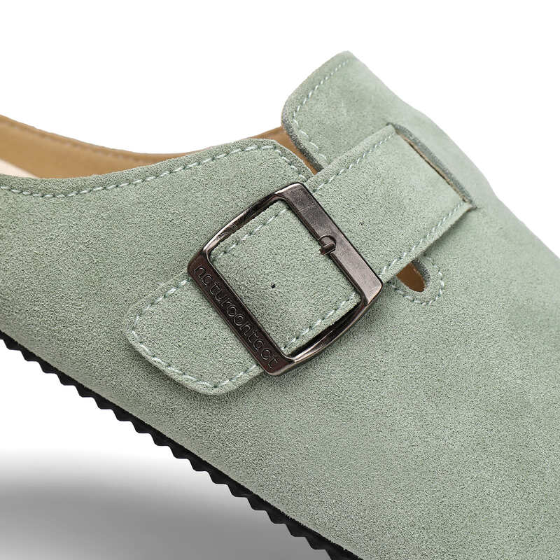 Green barefoot suede clog shoe with a buckle with naturcontact logo on a white background