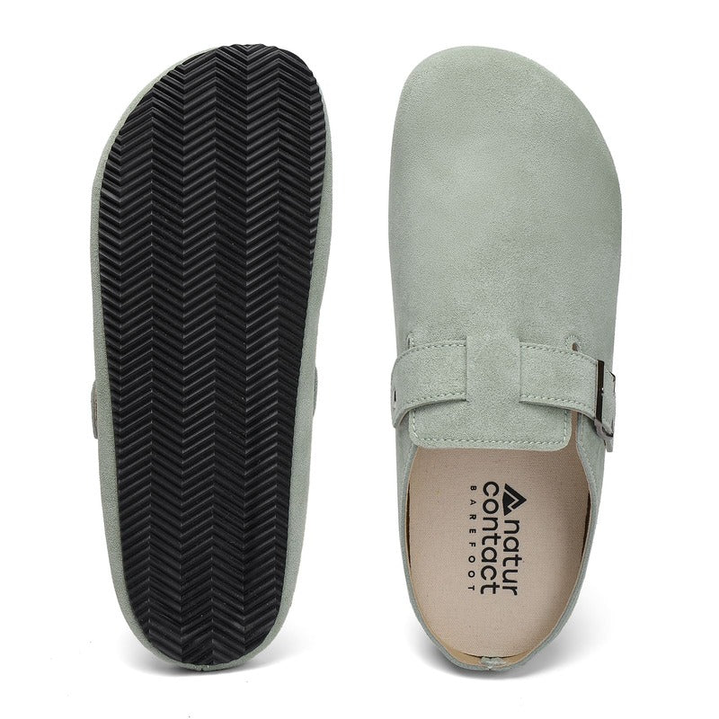 sage green barefoot suede clog with a strap and 'natur contact' branding on a white background
