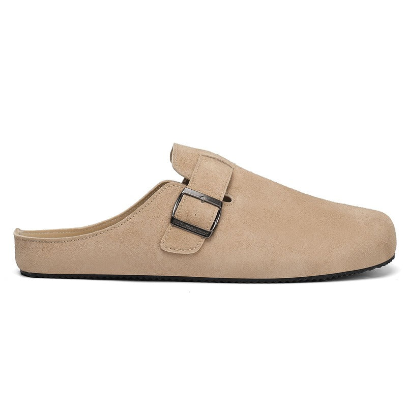 Beige barefoot suede clog shoe with a buckle on a white background