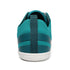 Teal barefoot sneaker with a white sole on a white background back view