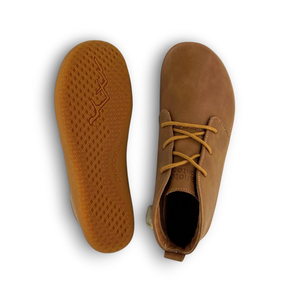 Naturcontact George smart barefoot shoes in brown worn outdoors, front view highlighting wide toe box, minimalist lacing, and natural walking stance.