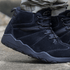 Close-up of Naturcontact Intemperia winter barefoot boots in Black, showing the flexible zero-drop sole, suede upper and natural foot-shaped design while worn outdoors.