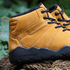Side close-up of Naturcontact Intemperia winter barefoot boots in Gold, highlighting the suede upper, reinforced stitching and flexible natural rubber sole with outdoor grip.