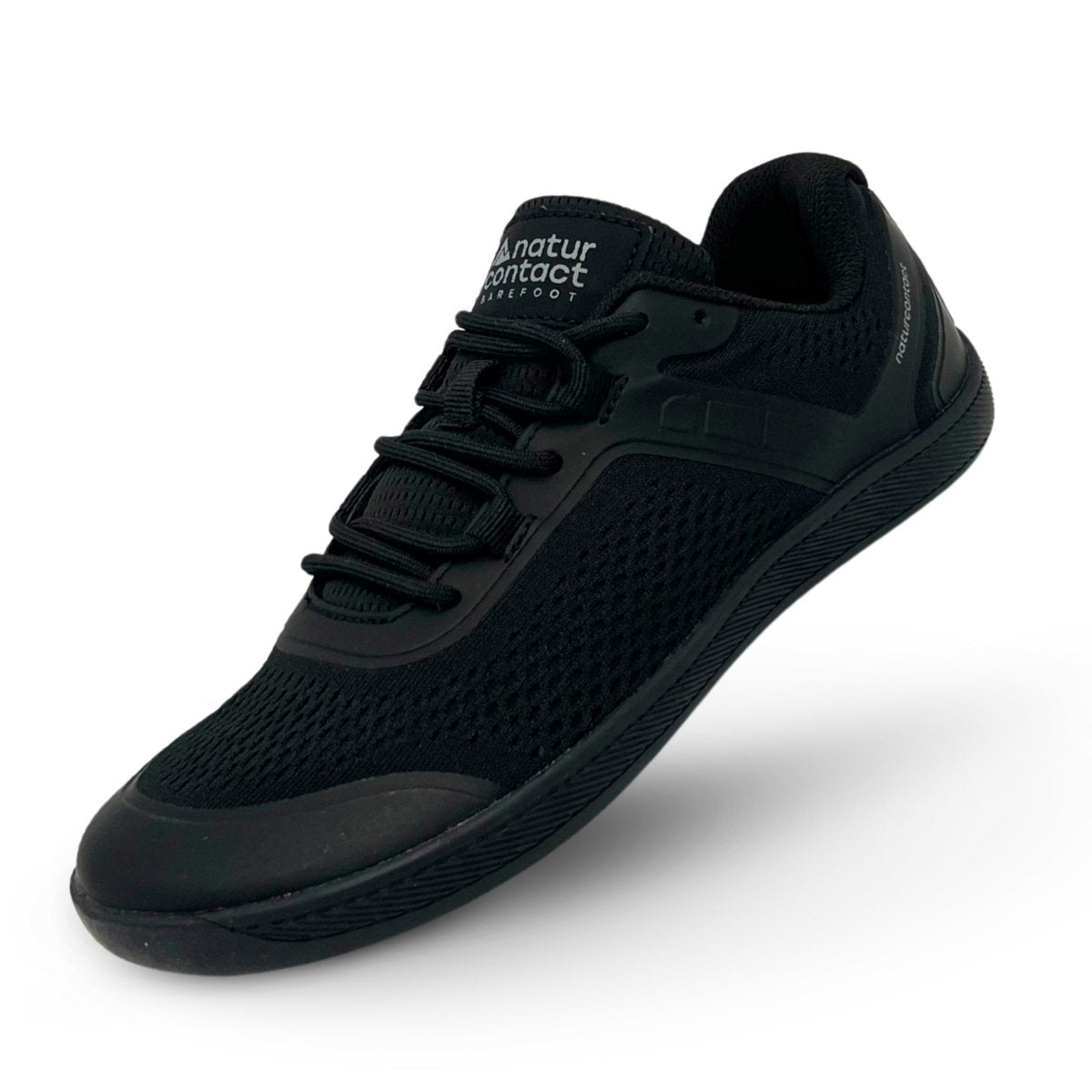 Black Naturcontact Metro Flex 3.0 barefoot shoes with breathable knit upper and flexible minimalist sole on white background