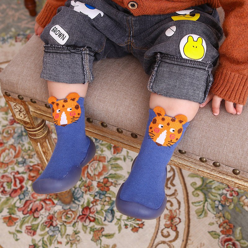 Naturcontact Mini Contact 2.0 baby barefoot shoes worn by toddler indoors, sock-style footwear with cute animal design, flexible sole and comfortable fit for everyday play.