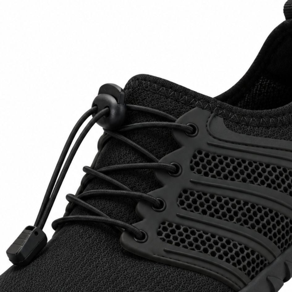Close-up of black Sport Contact 2.0 trainers showing the elastic quick-laces, eyelets and breathable black upper.
