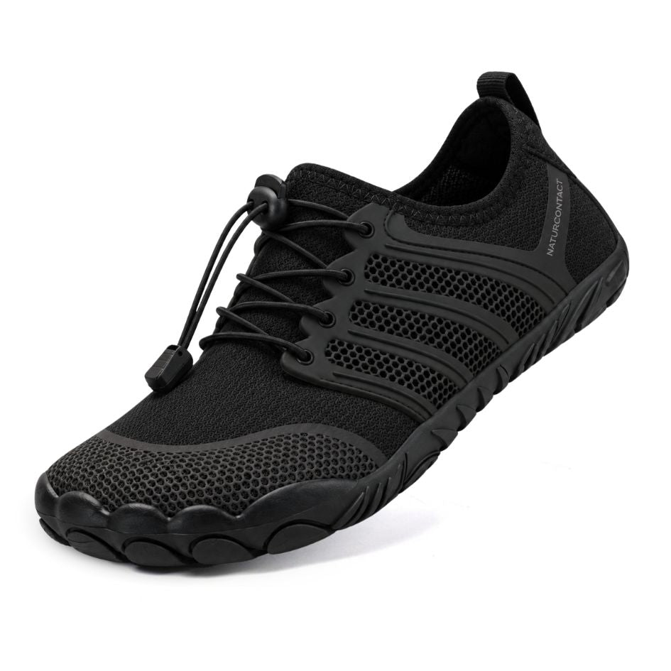 Three-quarter view of all-black Naturcontact Sport Contact 2.0 barefoot trainers with black quick-laces and flexible textured sole.