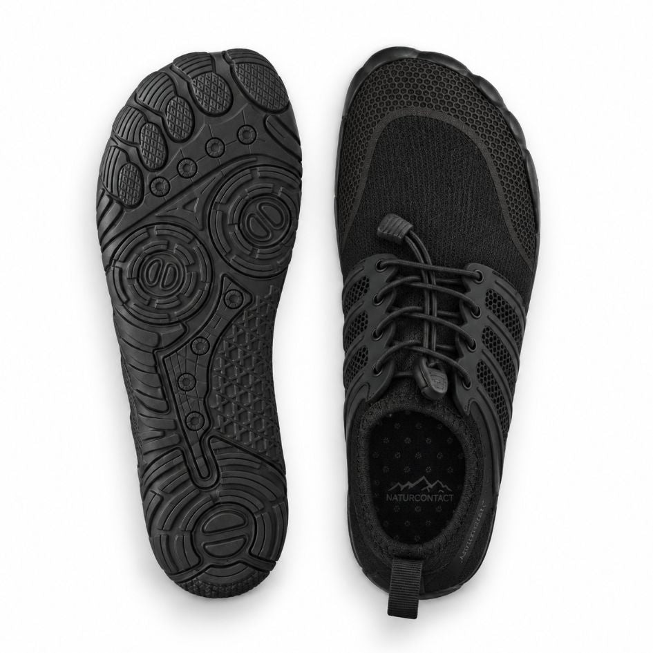 Top and outsole views of black Sport Contact 2.0 barefoot shoes showing the black lace system and patterned tread.