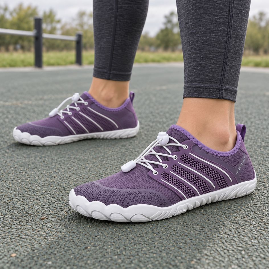 Lilac Sport Contact 2.0 barefoot trainers worn outdoors with dark leggings, showing the lightweight profile and white outsole.