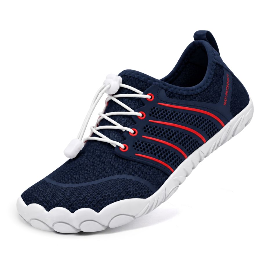 Three-quarter view of Naturcontact Sport Contact 2.0 barefoot trainers in navy blue with red side accents, white elastic quick-laces and a flexible white outsole.