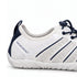 Heel detail of white and navy Naturcontact Sport Contact 2.0 showing side branding, dark blue accents and sculpted sole.