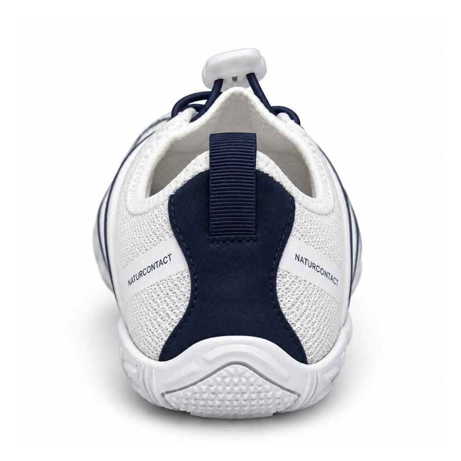 Rear view of white and navy Sport Contact 2.0 shoes showing the dark blue heel panel, pull tab and textured white sole.
