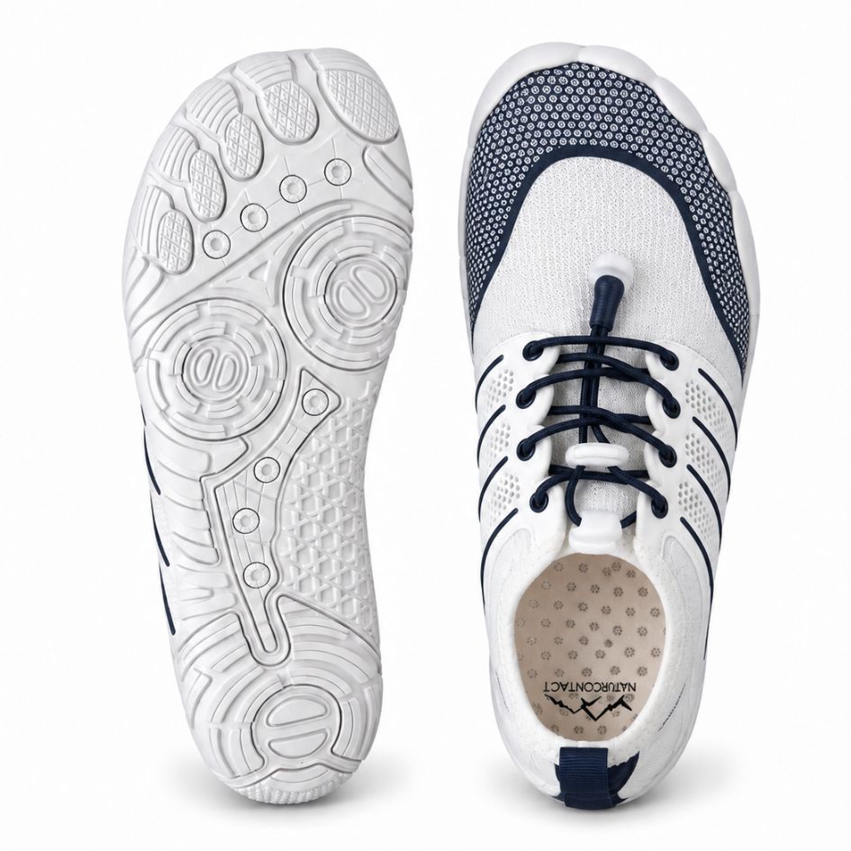Overhead and outsole views of white and navy Sport Contact 2.0 barefoot shoes showing the navy lacing system and white tread.