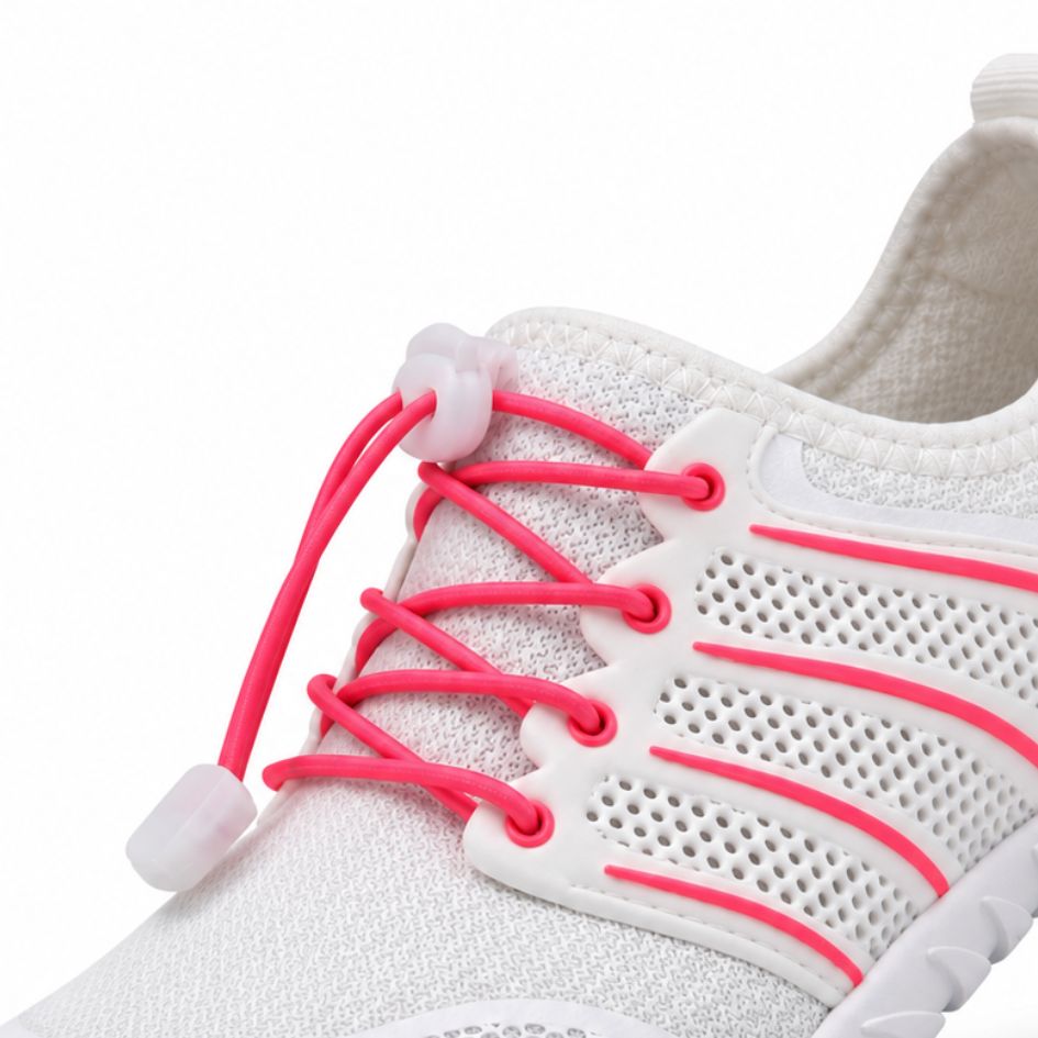 Close-up of Sport Contact 2.0 white and pink shoes showing bright pink elastic laces, eyelets, white lace lock and breathable mesh.