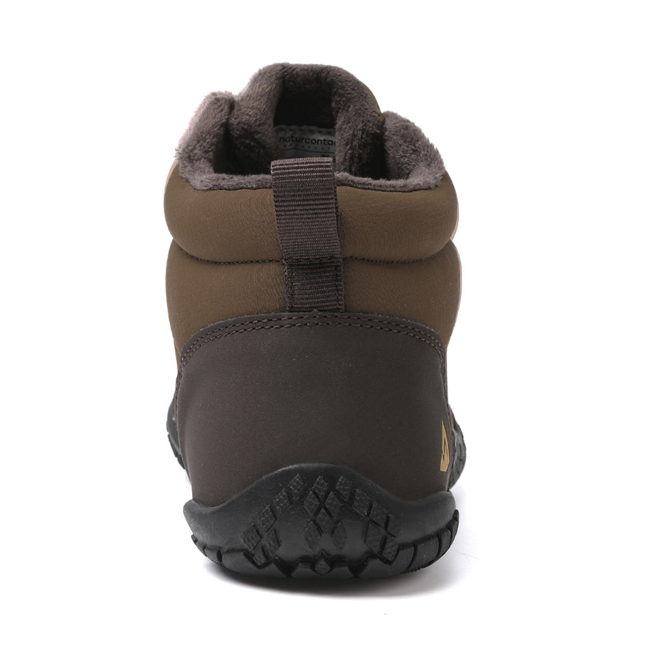 Rear view of the brown Storm Feel shoe, showing the heel and pull tab.
