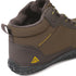 Close-up of the brown Storm Feel shoe showing its side panel, fleece collar and heel.