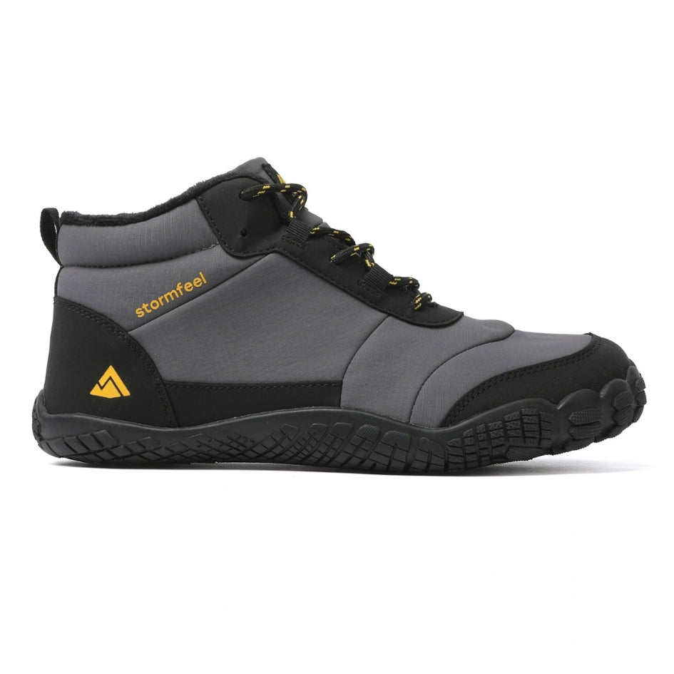 Side view of the grey Storm Feel barefoot winter shoe on a white background.