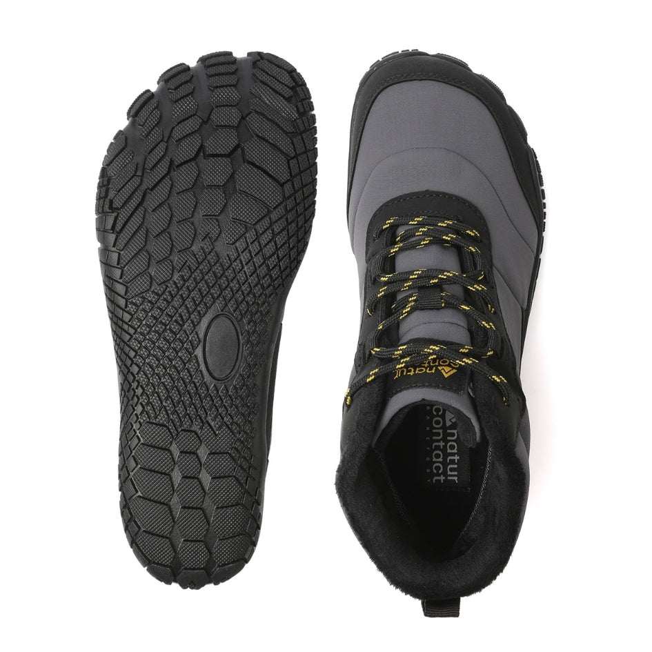 Grey Storm Feel shoes shown from above and underneath, displaying the upper and sole tread.