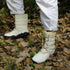 Naturcontact women’s winter barefoot boots worn outdoors on forest ground, showing flexibility and comfort in use