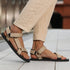 Naturwalkers 2.0 beige barefoot sandals worn while walking outdoors