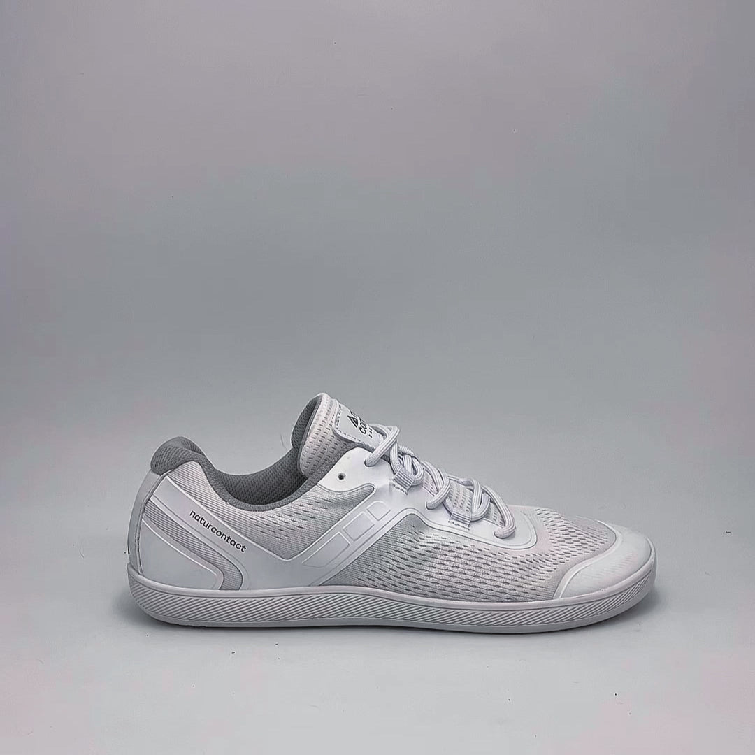 Video showing flexibility and close-up details of white daily barefoot shoes