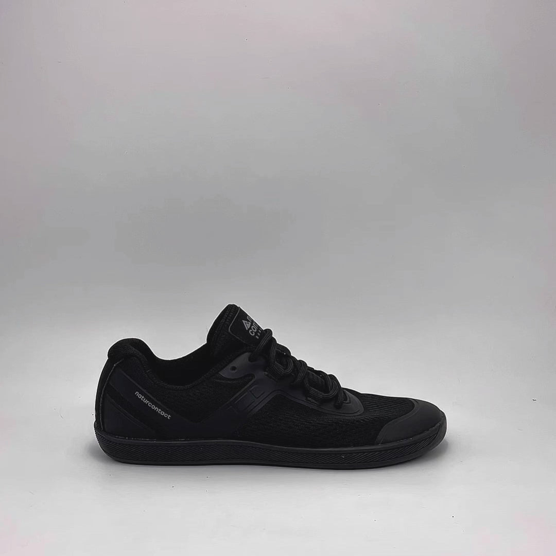 Video showing flexibility and close-up details of black daily barefoot shoes