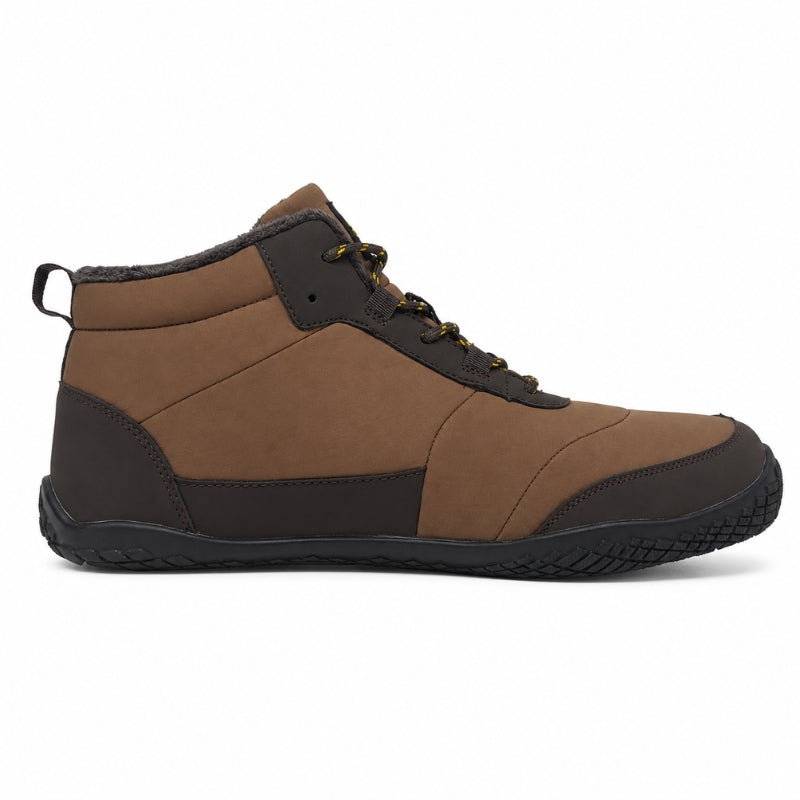 A mid-top ankle boot in brown and dark brown suede-like panels with black laces and a black sole, shown in a side profile on a white background.