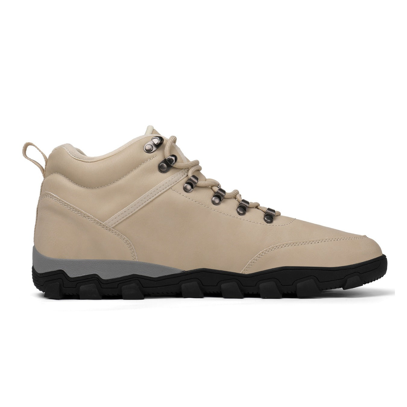 Beige hiking boot with black sole on a white background