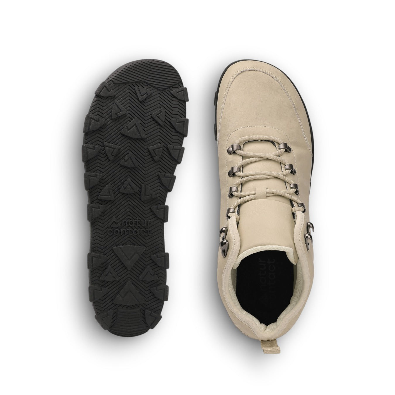 Beige shoe with black sole on a white background