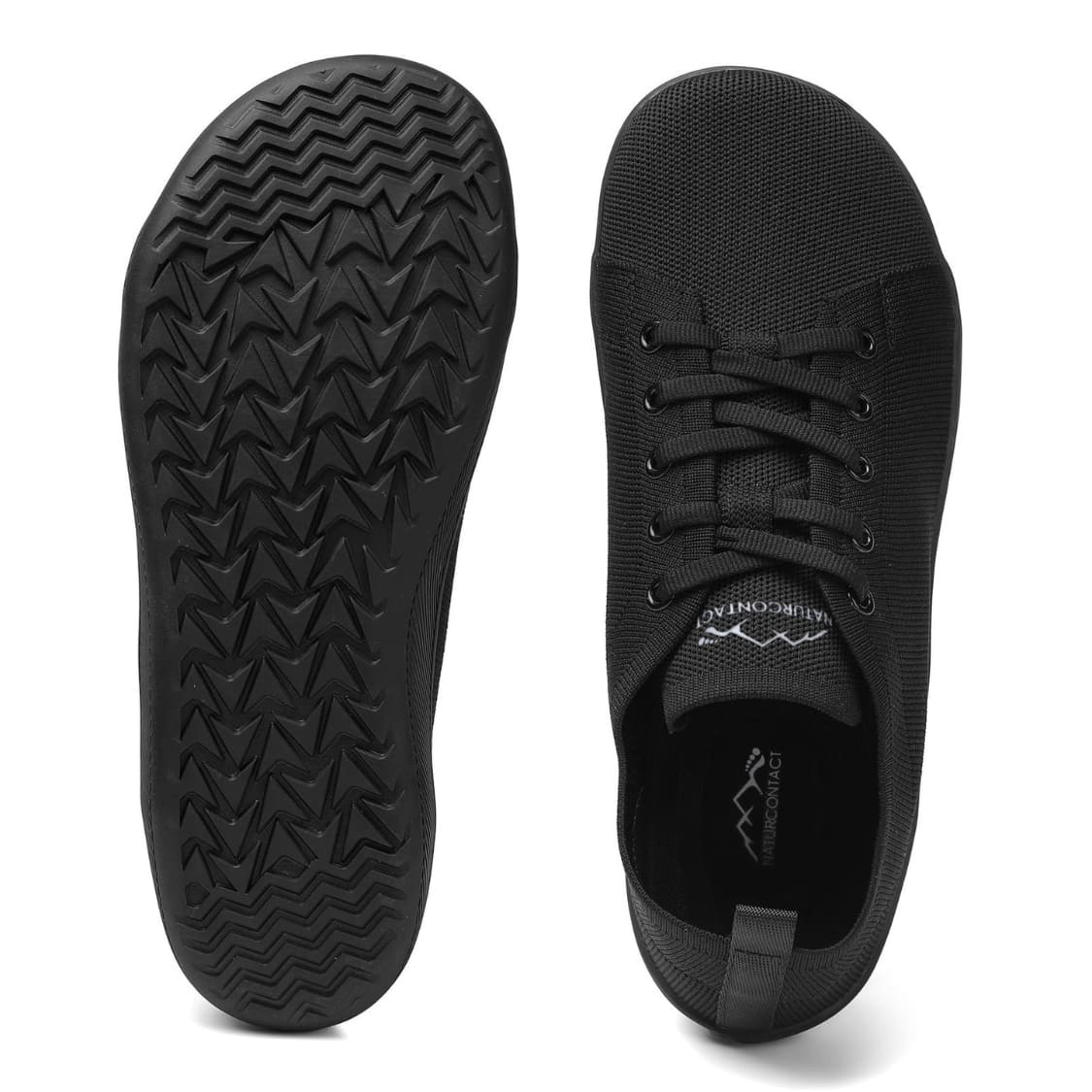 Black sneakers with sole and side views on a white background