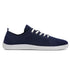 Navy blue sneaker with white laces on a white background
