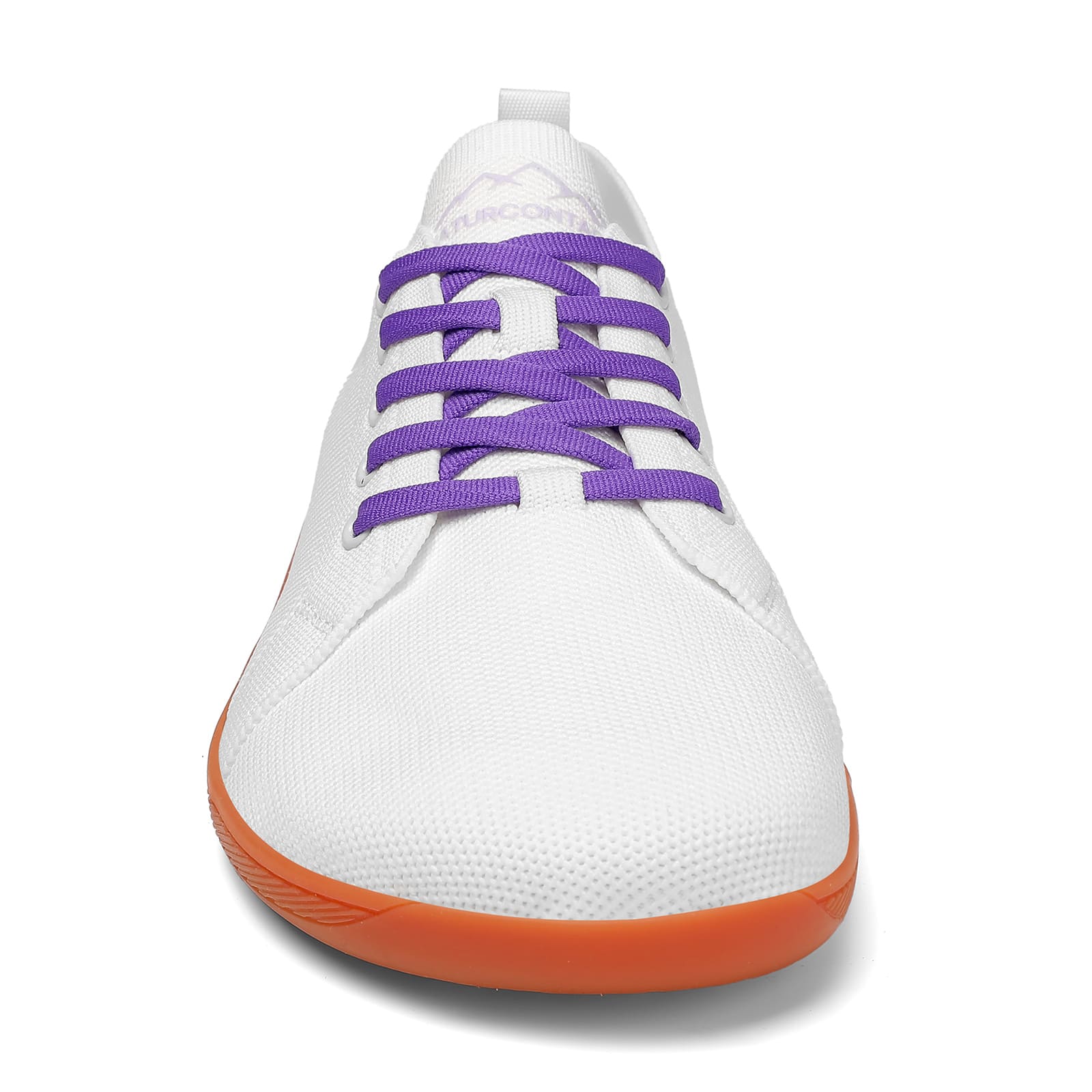 White sneaker with purple laces and orange sole on a white background