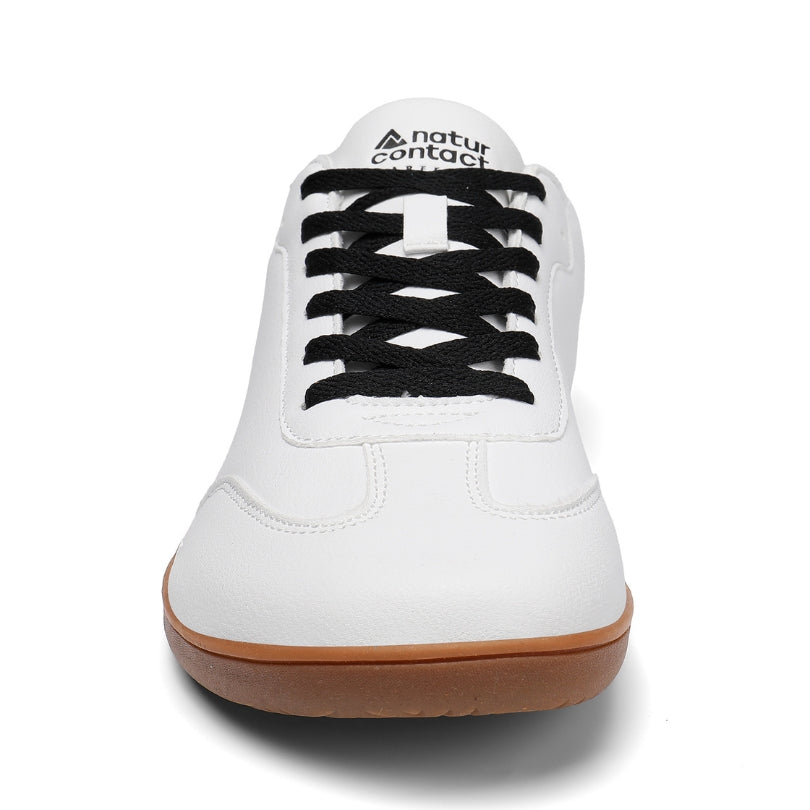 Front view of Walker Leather barefoot shoes in white and black with wide toe box for natural movement