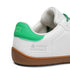 Heel detail of Walker Leather barefoot shoes in white and green with Naturcontact logo