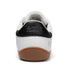 Rear view of Walker Leather barefoot shoes in white and black with padded heel collar