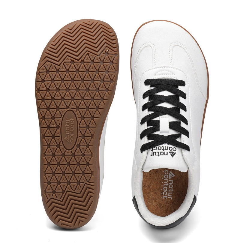 Sole and top view of Walker Leather barefoot shoes in White / Black with flexible rubber outsole