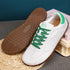 Walker Leather barefoot shoes in white and green displayed as a styled product shot for everyday use