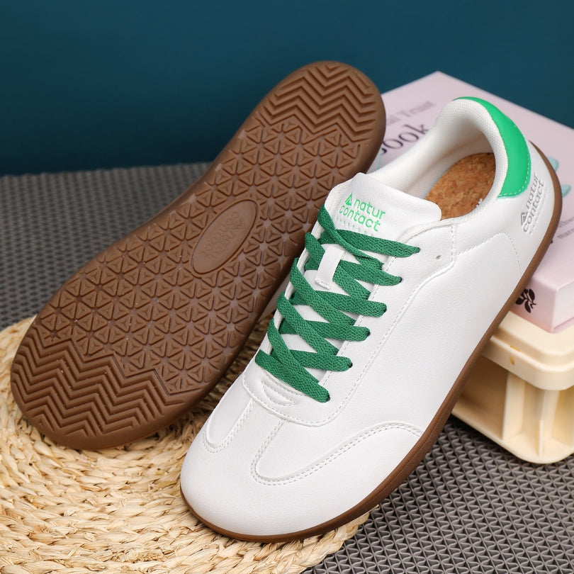 Walker Leather barefoot shoes in white and green displayed as a styled product shot for everyday use