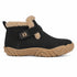A single black ankle boot with a tan sole and beige shearling lining, shown from a side profile on a white background.