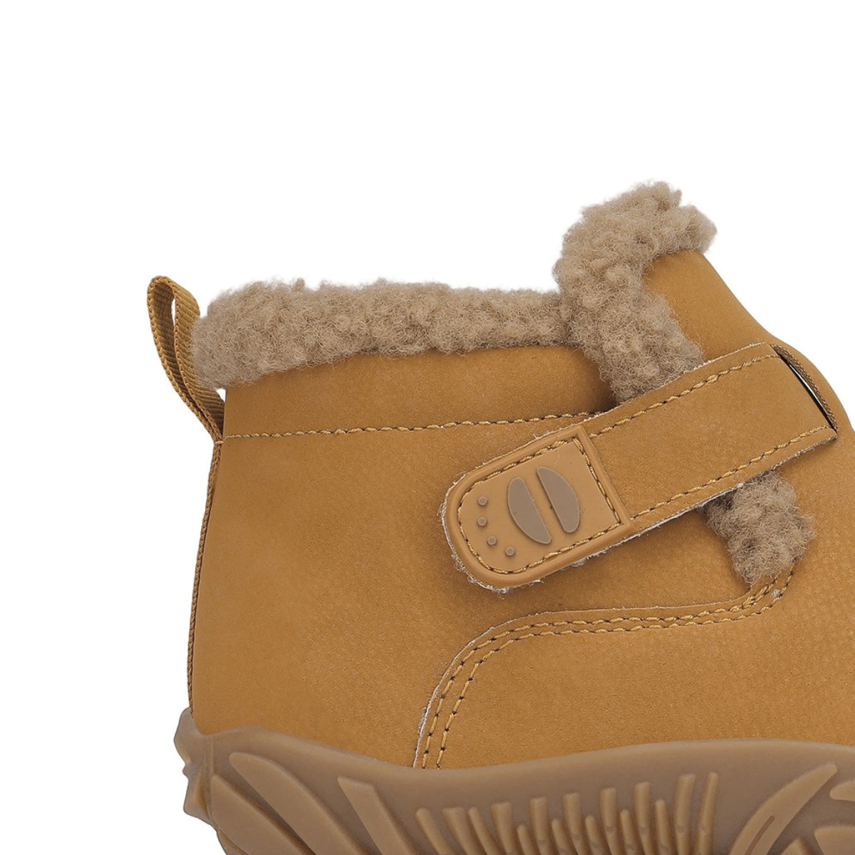 Close-up of a tan suede winter boot with a fuzzy beige fleece lining and a hook-and-loop strap closure, shown on a white background.