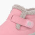 A close-up of a pink children's winter boot featuring a soft gray faux-fur collar and a matching pink hook-and-loop strap closure with a gray buckle.